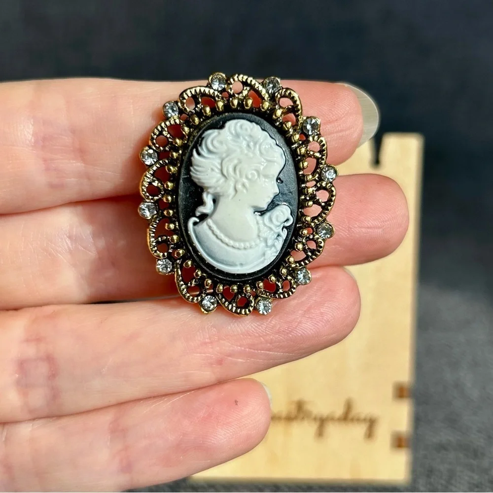 Sparkly Cameo Brooch Pin, Rhinestone Filigree Edging Detail, Black, White, Gold